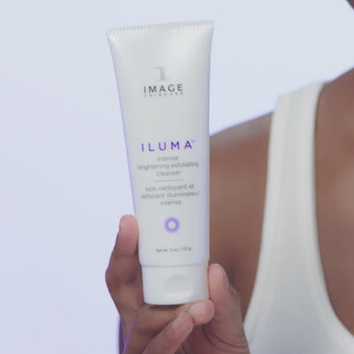 video of model applying exfoliating cleanser and wiping off