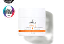 Image of a skincare cream jar with awards on a white background
