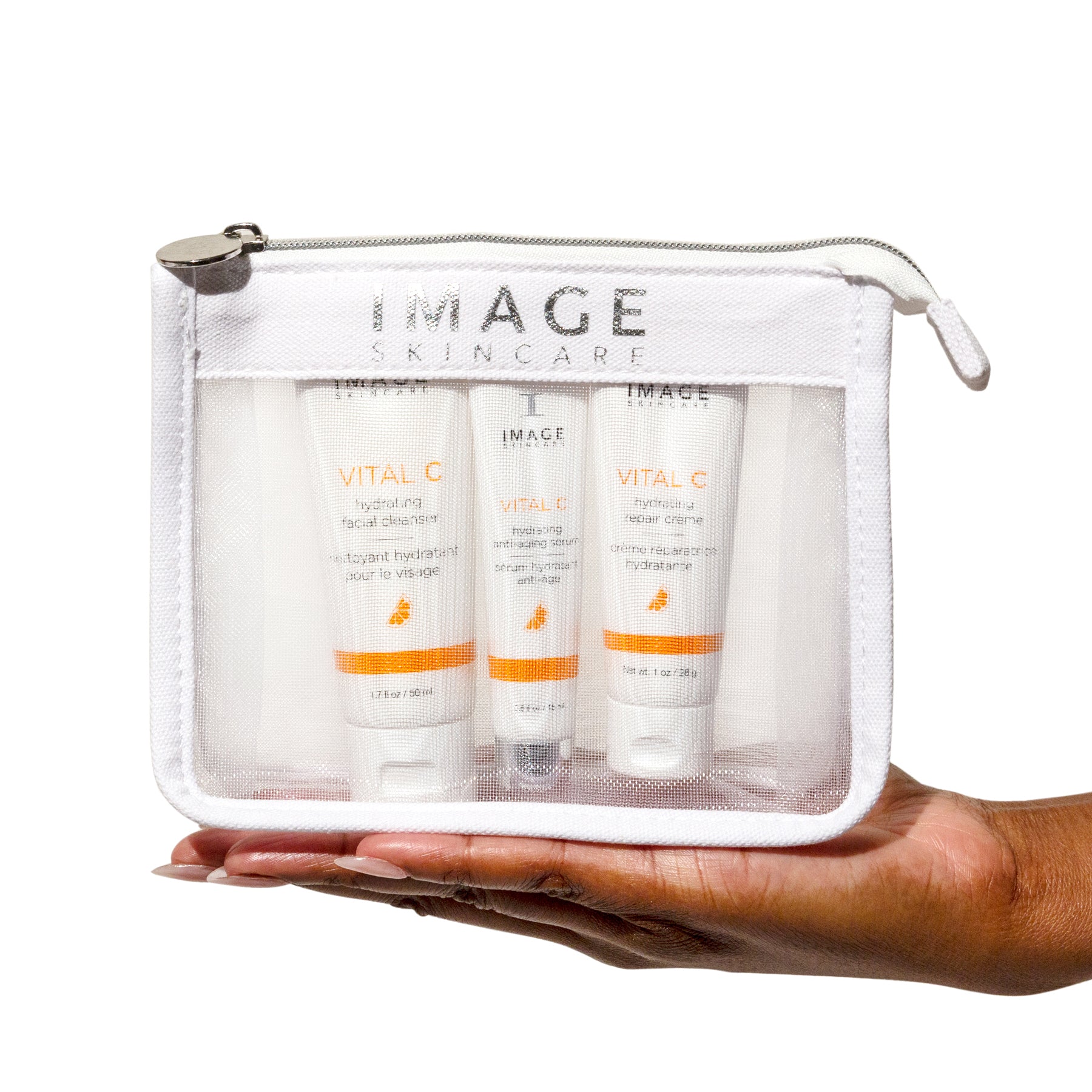 model hand holding kit in bag
